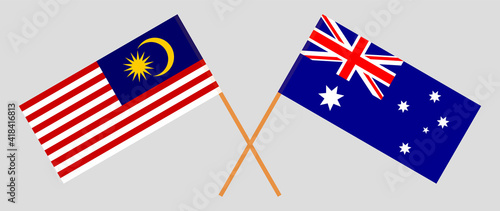 Crossed flags of Malaysia and Australia. Official colors. Correct proportion