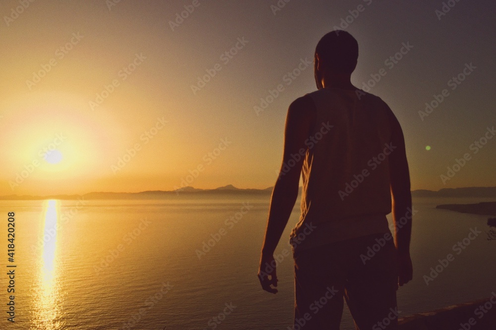 Silhouette and sunset with the sea in the background on the island of Mallorca, Spain Silhouette and sunset with the sea in the background on the island of Mallorca, Spain