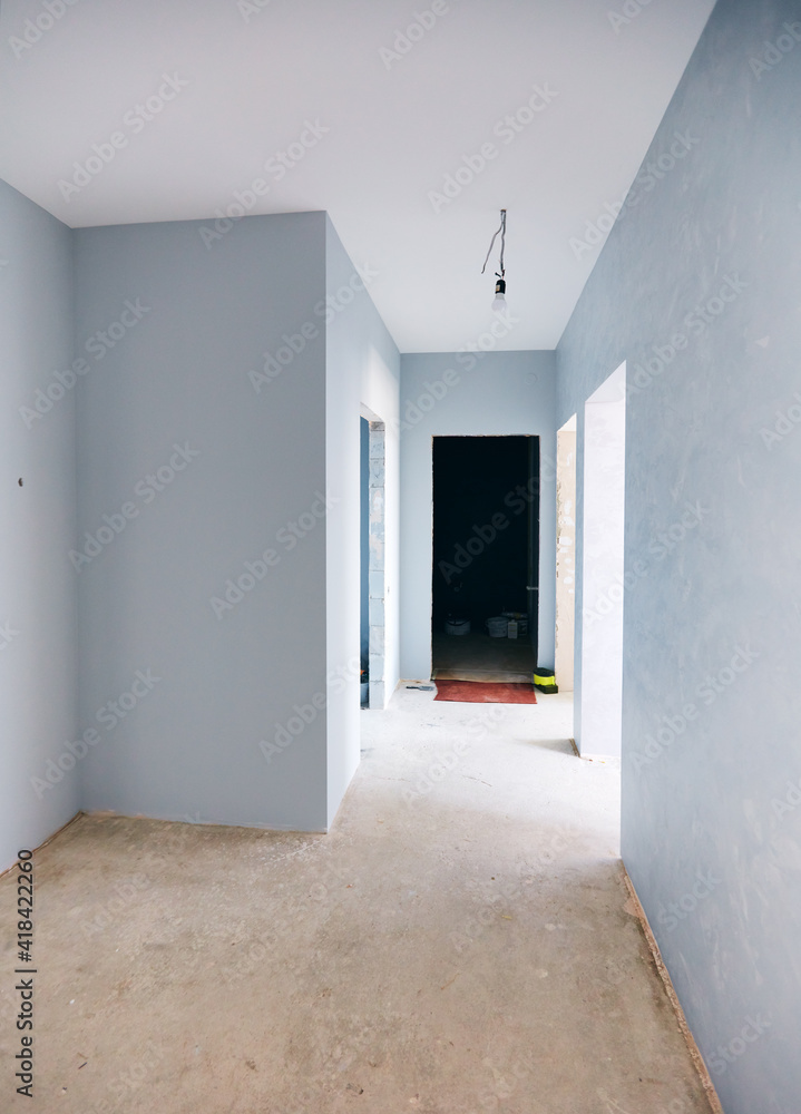 Fototapeta premium a new apartment repair finishing works in progress, plastering, painting and flooring constraction