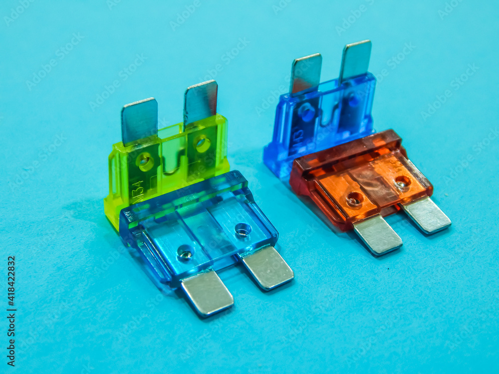 Obraz premium fuses of different colors on a blue background