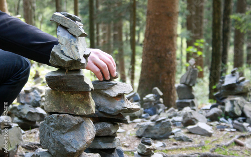 man builds cairns as a guide