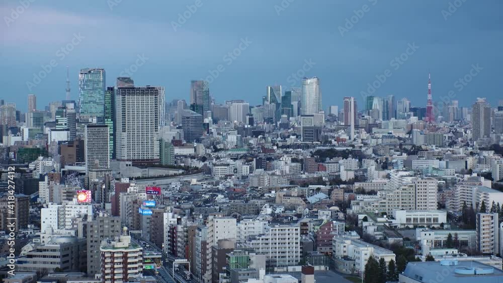 TOKYO, JAPAN : Aerial sunrise CITYSCAPE of TOKYO. View of dawn city and buildings at central downtown area. Japanese urban city life and metropolis concept. Long time lapse video, night to morning. TOKYO, JAPAN : Aerial sunrise CITYSCAPE of TOKYO. View of dawn city and buildings at central downtown area. Japanese urban city life and metropolis concept. Long time lapse video, night to morning.