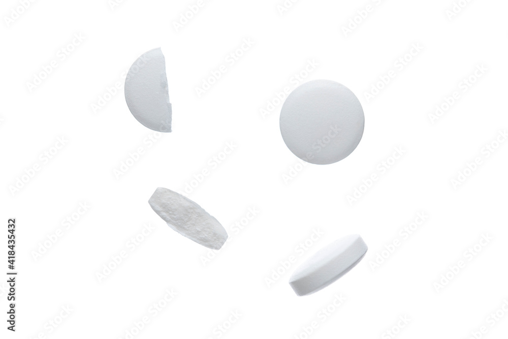 White pills on a white background.
A small round mass of solid medicine. White pills on a white background.
A small round mass of solid medicine.