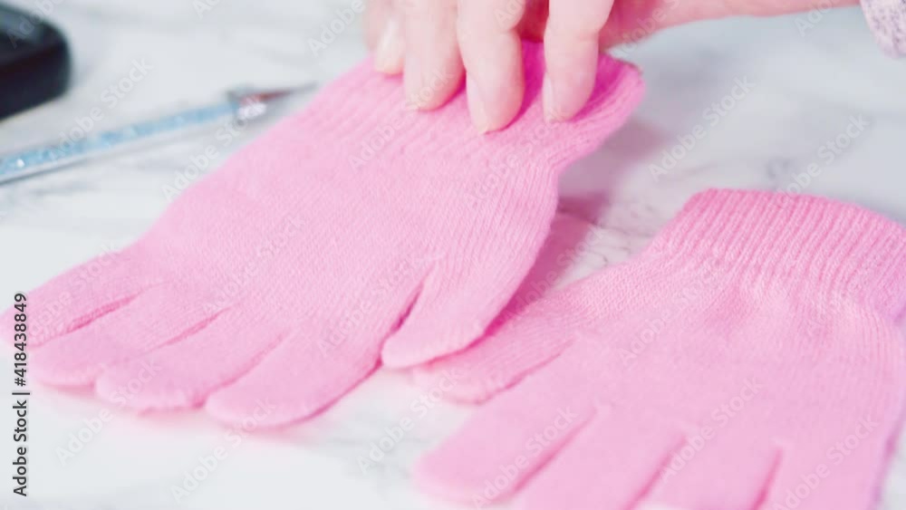 Rhinestone pink kids gloves with snowflake shapes. Rhinestone pink kids gloves with snowflake shapes.