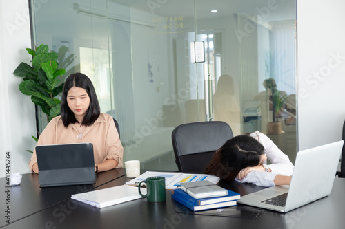 Cropped shot of businesswoman headache while working with laptop in the office.
 photo