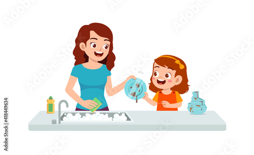 happy cute little girl washing dish with mother