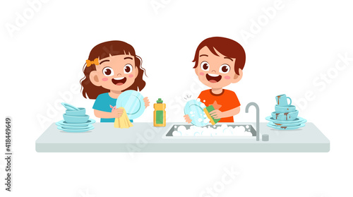 happy cute little boy and girl washing dish together