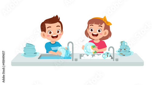 happy cute little boy and girl washing dish together