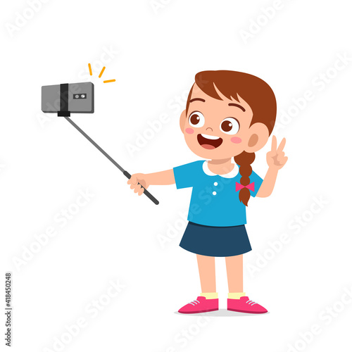 cute little kid girl pose and selfie in front of camera