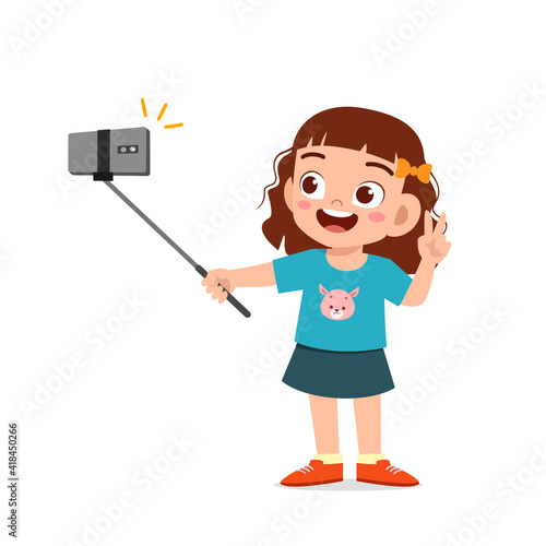 cute little kid girl pose and selfie in front of camera