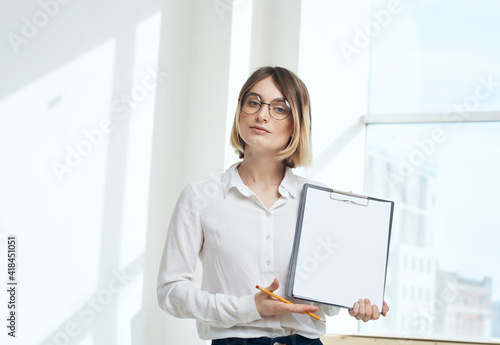 room finance woman business documents interior window