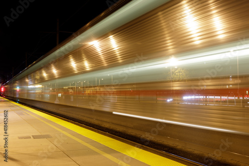 Train Passing Terminus in San Francisco Bay Area at Night