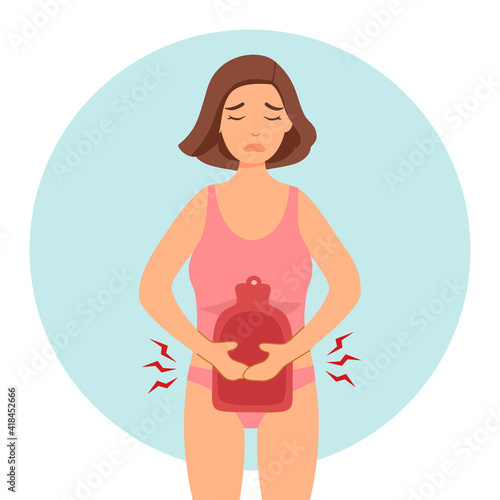 Woman having period pain. Menstrual cramps. Female relief pain with hot water bag.	