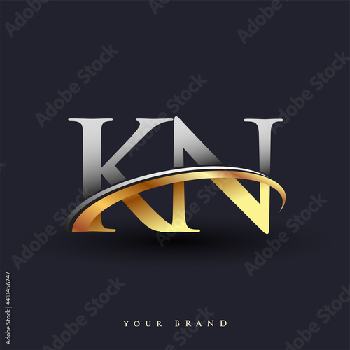 KN initial logo company name colored gold and silver swoosh design, isolated on white background. vector logo for business and company identity.