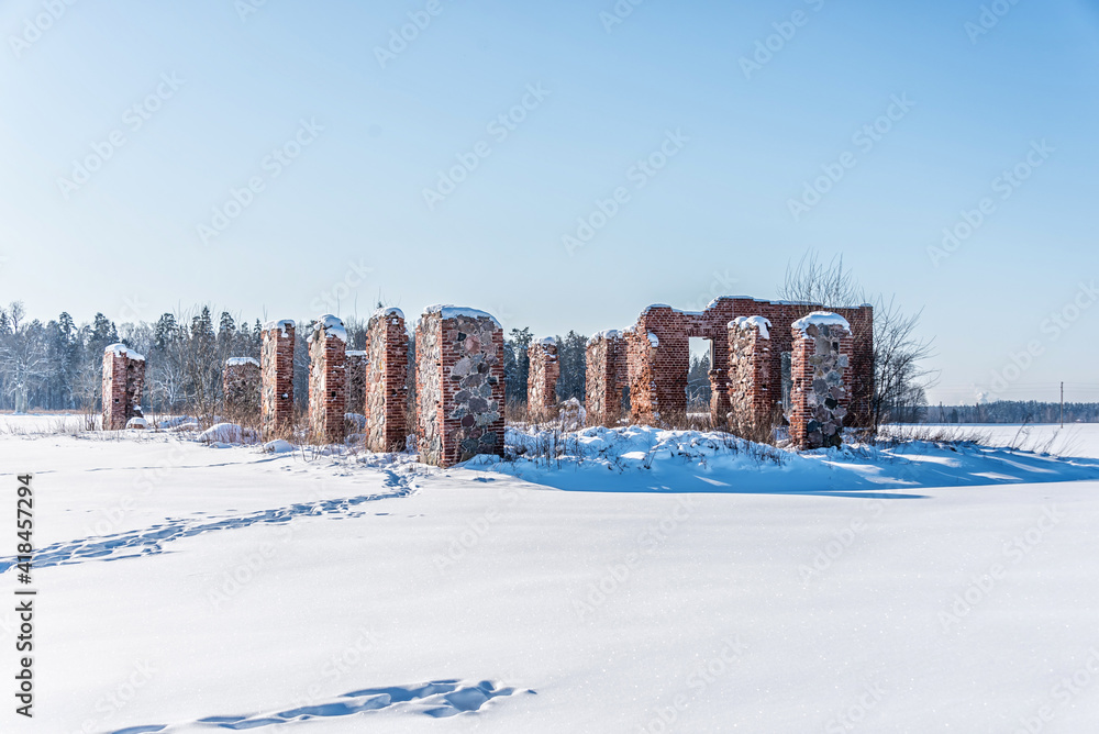 Ancient Ruins in a Frozen Winter Snow Covered Field in Latvia