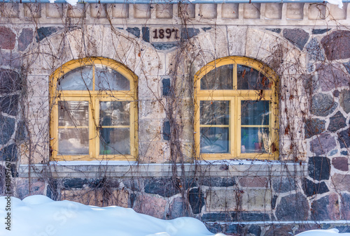 Windows in Ancient Ruins Covered with Snow in Winter in Latvia