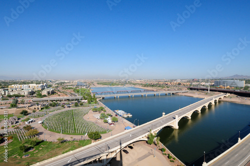 Aerial view of Tempe Town Lake showing bridges and beach in Tempe, Arizona