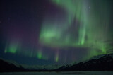 Aurora over Alaskan mountains