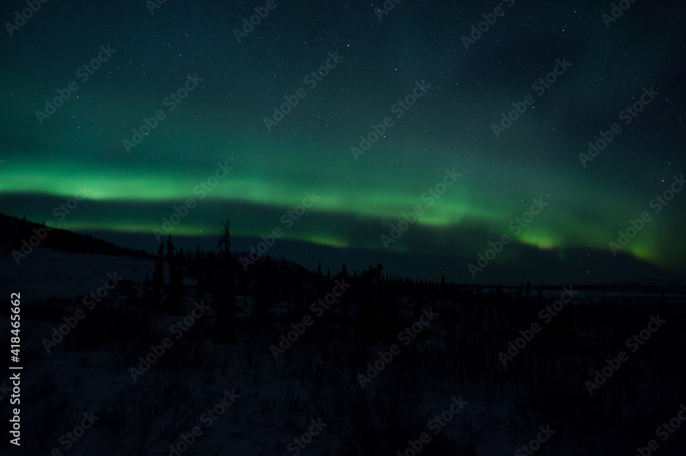 Aurora over Alaska tundra