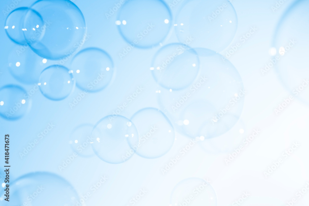 Natural Freshness Transparent Blue Soap Bubbles Floating Background.