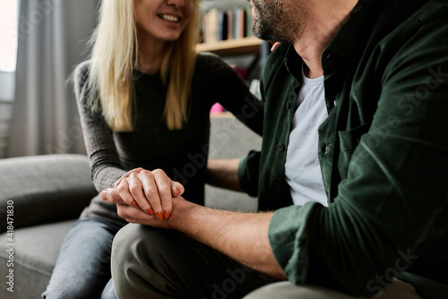 Happy spouses supporting each other after session