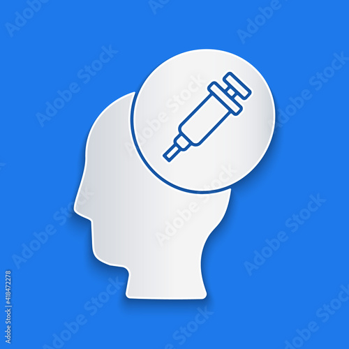 Paper cut Addiction to the drug icon isolated on blue background. Heroin, narcotic, addiction, illegal. Sick junkie with a syringe and medical pills. Paper art style. Vector.