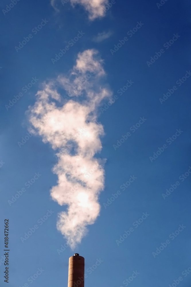 Smoke Stack Steam Cloud and Blue Sky
