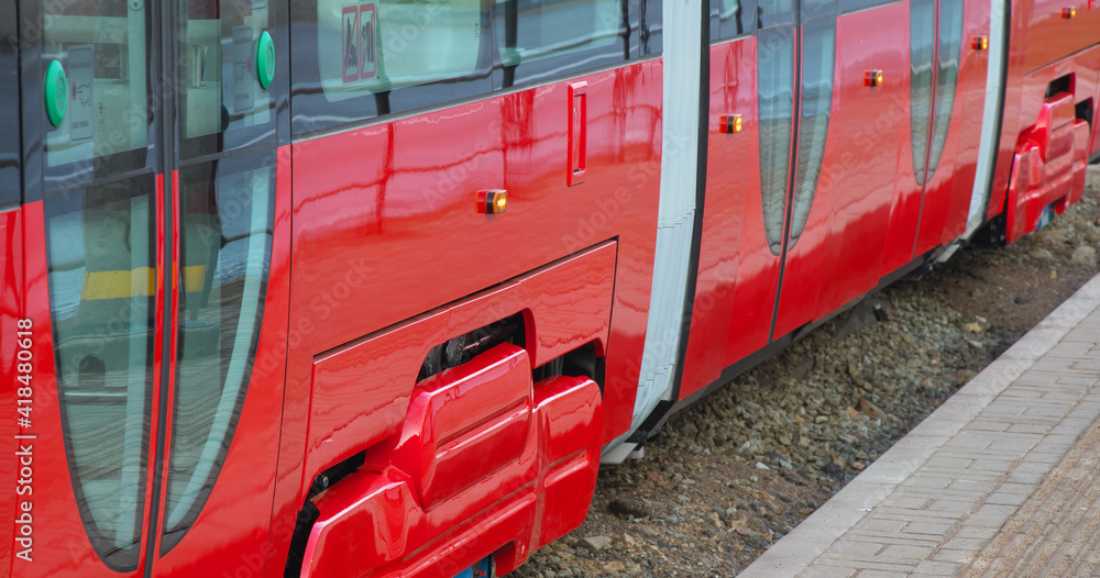 Fototapeta premium Narrow-gauge low-floor tram. Selective focus.