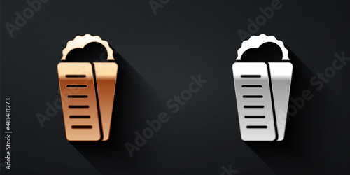 Gold and silver Gyros Pita Greek fast food traditional cuisine icon isolated on black background. Gyro with greek salad in tzatziki sauce wrapped sandwich. Long shadow style. Vector.