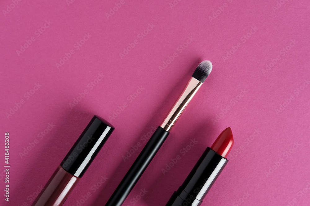 Set of makeup cosmetics on pink background. Set of makeup cosmetics on pink background.