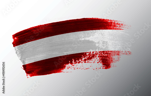 Austria flag illustrated on paint brush stroke