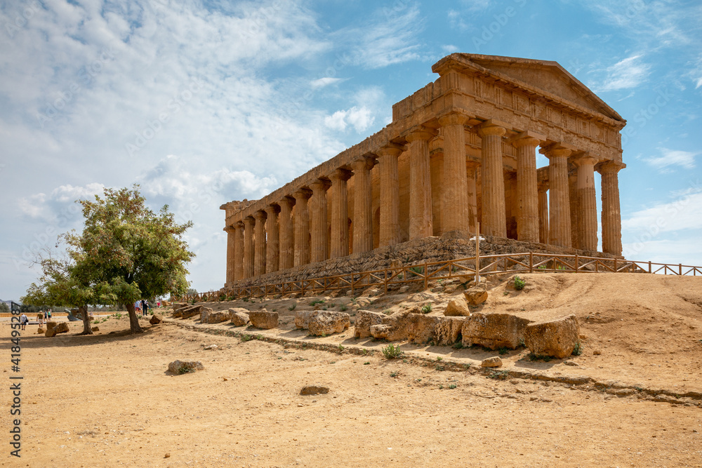 View of the Valle dei Templi near Agrigento in Sicily. A sunny morning with beautiful light emphasizes the charms of Greek ruins.