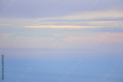 seascape - the sea merges with the sky in the dawn fog