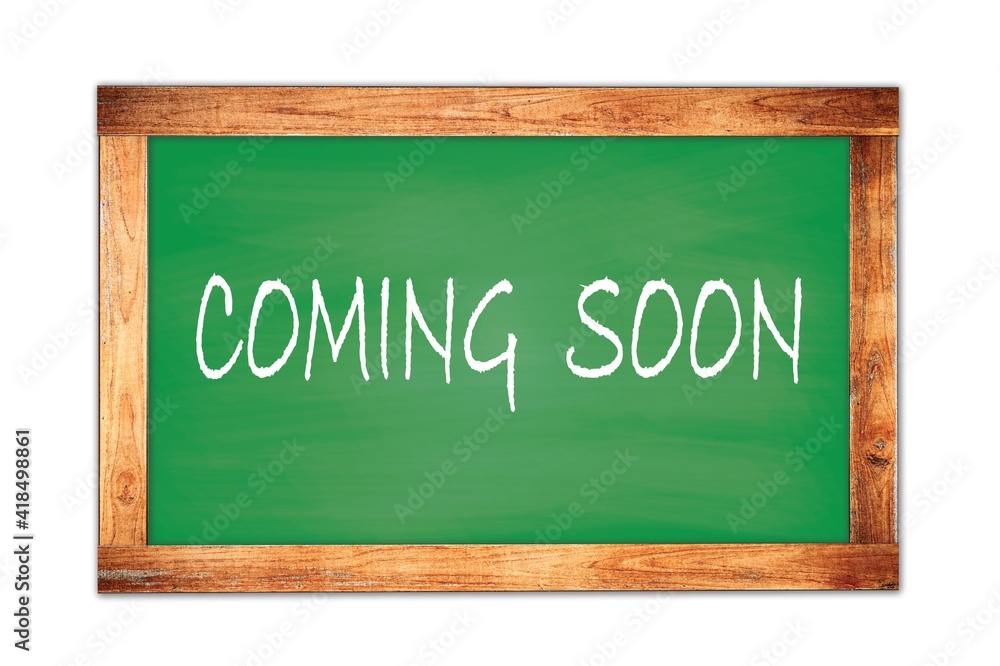 COMING SOON text written on green school board. COMING SOON text written on green school board.