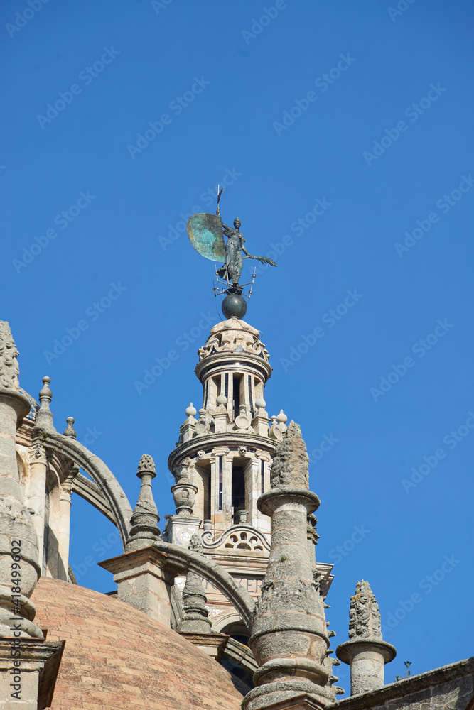 Fototapeta premium Seville, Andalusia, Spain, Europe. Famous tower of Giralda, Islamic architecture built by the Almohads and crowned by a Renaissance bell tower with the statue of Giraldillo at its top.