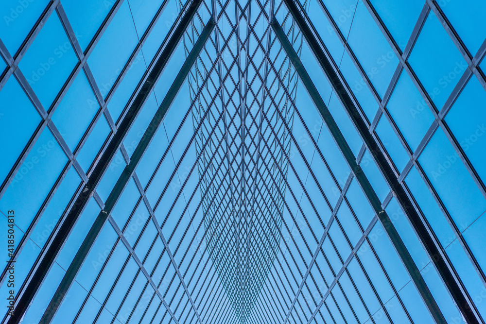 underside panoramic and perspective view to steel blue glass high rise building skyscrapers, business concept of successful industrial architecture underside panoramic and perspective view to steel blue glass high rise building skyscrapers, business concept of successful industrial architecture