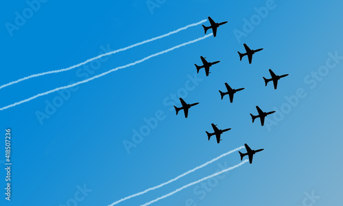 Indian Air Force Surya Kiran Aerobatic Team performs at an air show 