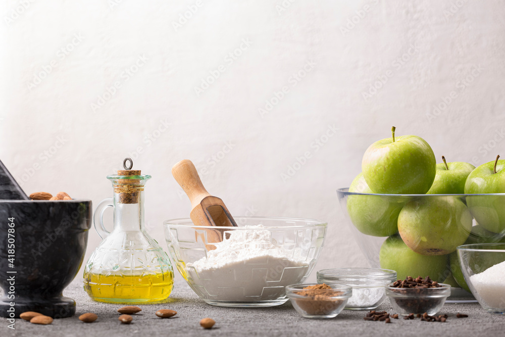 The concept of home cooking from natural products on a light background. The concept of home cooking from natural products on a light background.