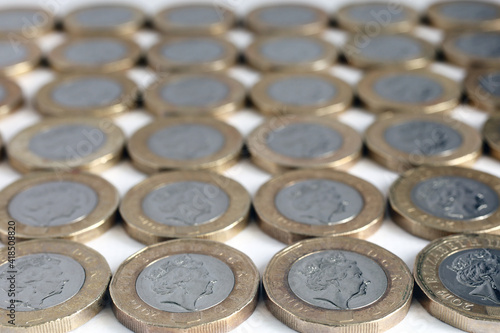 Lines of pound coins