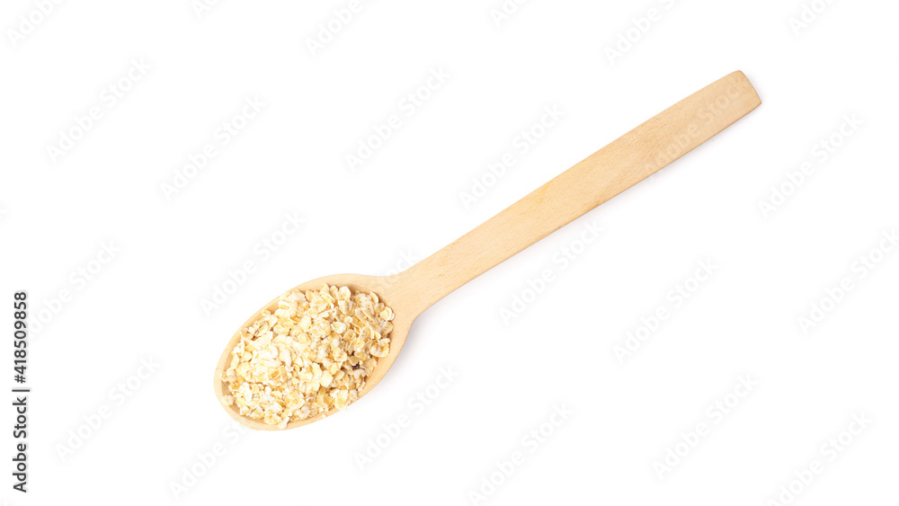 wooden spoon with oatmeal isolated on white wooden spoon with oatmeal isolated on white