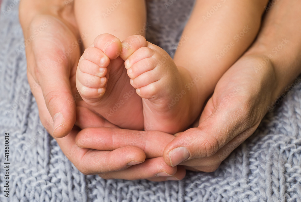 small pink feet of the baby close up small pink feet of the baby close up