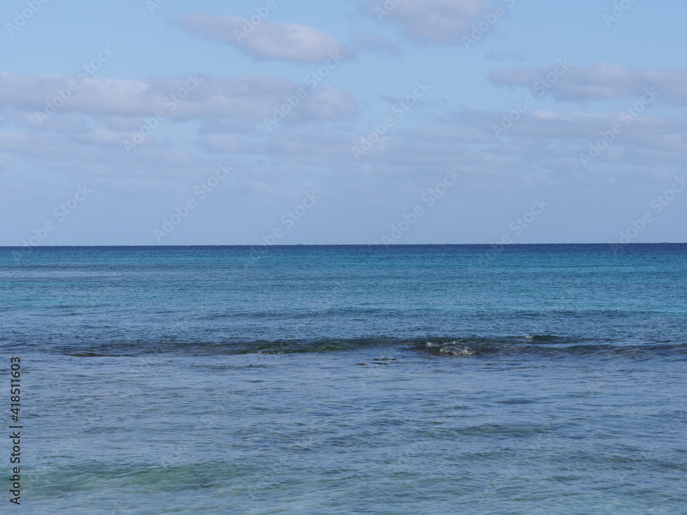 Obraz premium Atlantic Ocean landscapes seen from african Santa Maria town at Sal island in Cape Verde, clear blue sky in 2019 warm sunny spring day on March.
