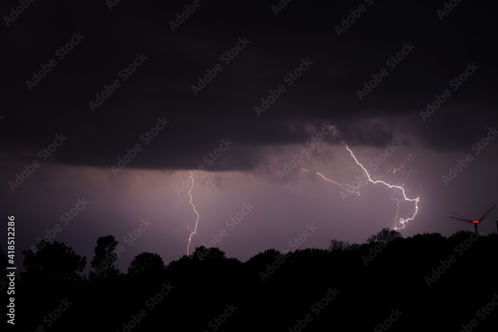 lightning in the sky in thunderstorm