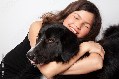Little teen girl with her dog