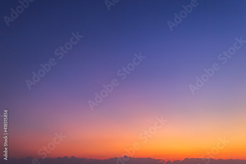 Colorful sunset sky in the evening on twilight, dusk sky background 
