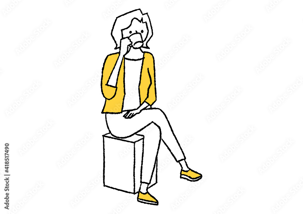 Fototapeta premium カフェでイスに座ってコーヒーを飲む女性