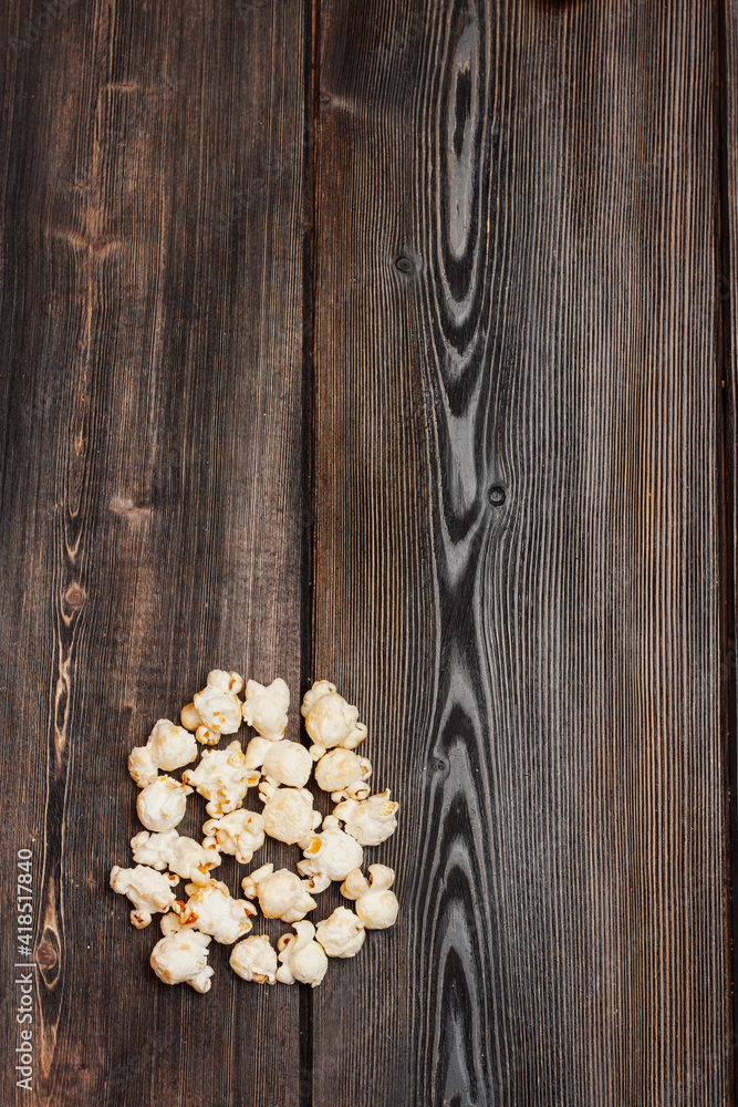 popcorn on a wooden table enjoyment rest meal snack