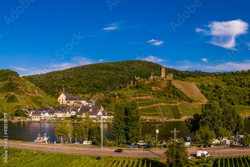 Panoramic view of the Moselle vineyards near Beilstein, Germany. Metternich Castle above the Moselle river. .Drone photography.