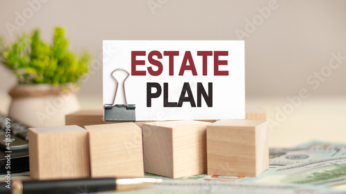 piece of paper with the text: ESTATE PLAN, business and finance concept