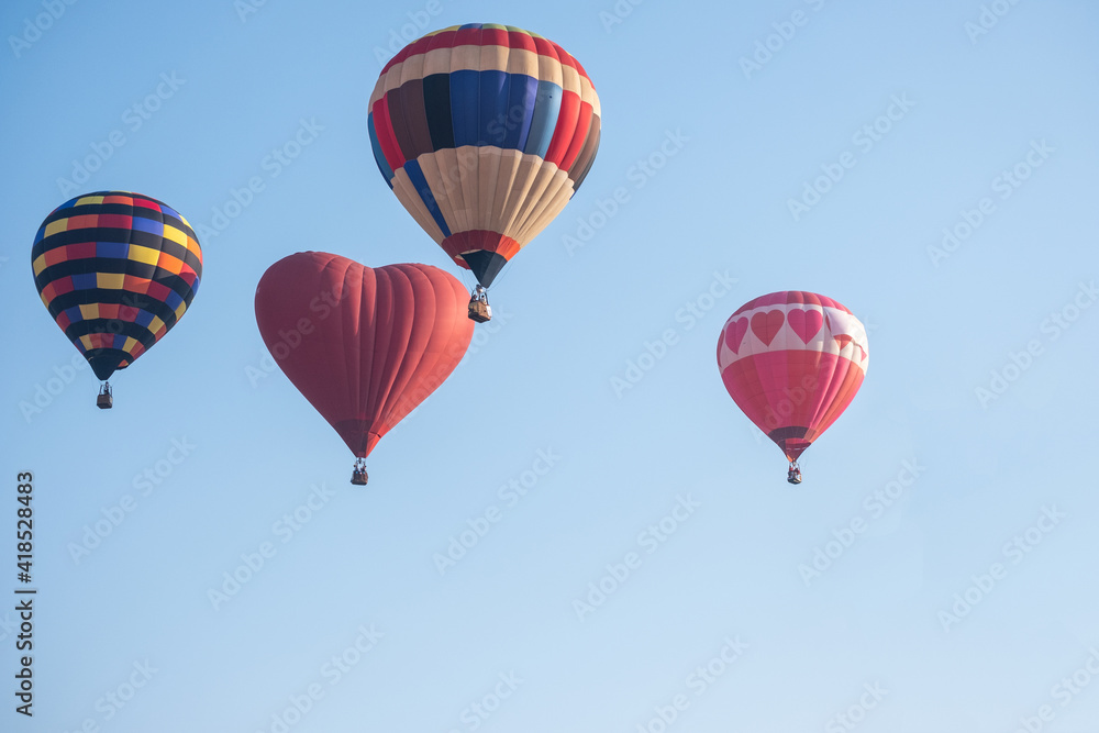 Beautiful colors of the hot air balloons flying on the sky Beautiful colors of the hot air balloons flying on the sky